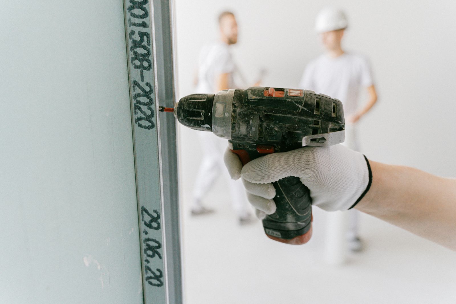 Screwing drywall to metal studs