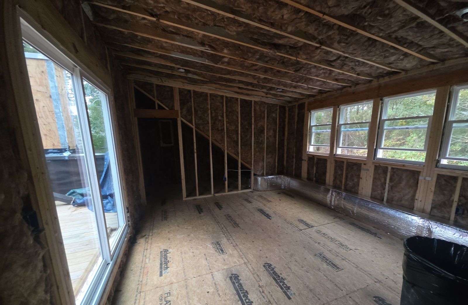 Room addition framed and insulated, ready for drywall