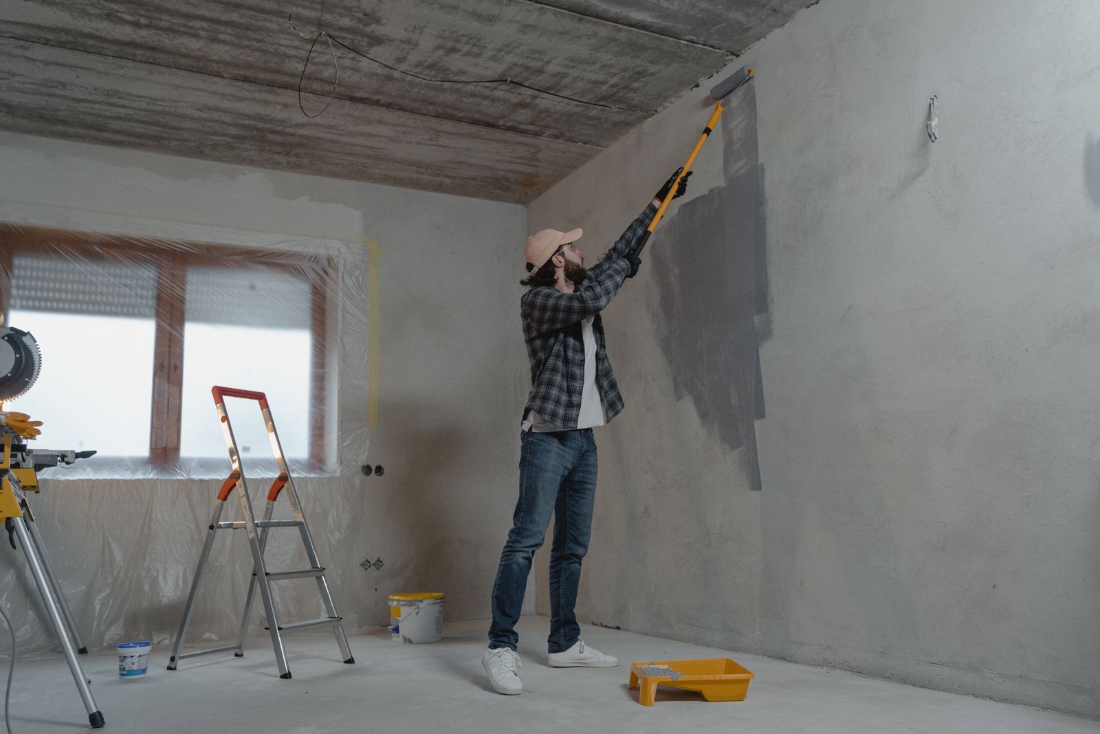 Painting an interior wall with a roller